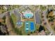 Aerial view of the community pool, basketball court, pickleball court, and parking area at 7219 Yellowhorn Trl, Waxhaw, NC 28173