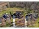 Aerial view of the property showcasing its landscaping, driveway, and neighborhood at 7219 Yellowhorn Trl, Waxhaw, NC 28173