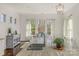 Bright kitchen with granite countertops, stainless faucet and dining area at 7219 Yellowhorn Trl, Waxhaw, NC 28173