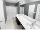 Bathroom with double vanity, soaking tub and tile floors at 7310 Sun Dance Dr, Fort Mill, SC 29707