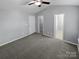 Primary bedroom with ceiling fan and private bathroom access at 7310 Sun Dance Dr, Fort Mill, SC 29707