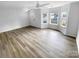 Bright living room with hardwood floors and bay window at 7310 Sun Dance Dr, Fort Mill, SC 29707