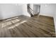 Living room with hardwood floors and staircase at 7310 Sun Dance Dr, Fort Mill, SC 29707