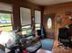 Wood paneled office space with natural light, creating a cozy and productive work environment at 784 Crestmont Se Dr, Concord, NC 28025