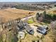 Aerial view of property, including home and outbuildings at 8478 Rocky River Rd, Harrisburg, NC 28075