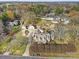 Aerial view of house, detached garage and large lot at 8478 Rocky River Rd, Harrisburg, NC 28075