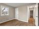 Bedroom featuring a window, hardwood flooring, and a doorway at 901 Wyke Rd, Shelby, NC 28150