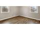 Bedroom featuring two windows and hardwood flooring at 901 Wyke Rd, Shelby, NC 28150