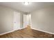 Bedroom featuring hardwood flooring and a doorway at 901 Wyke Rd, Shelby, NC 28150