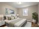 Comfortable bedroom with a plush bed, stylish decor, and natural light at 901 Wyke Rd, Shelby, NC 28150