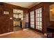 Open dining area with hardwood floors and a view into the kitchen at 904 Mcalway Rd # B, Charlotte, NC 28211