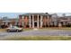 Brick building with columns, landscaping, and ample parking at 904 Mcalway Rd # B, Charlotte, NC 28211