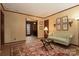 Spacious living room features hardwood floors, a decorative rug, and ample natural light at 904 Mcalway Rd # B, Charlotte, NC 28211