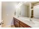 Bathroom boasts double sinks, a large mirror and a shower at 104 N Canyon Ridge Dr, Mount Holly, NC 28120