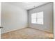 Simple bedroom with neutral walls and carpeted floors at 104 N Canyon Ridge Dr, Mount Holly, NC 28120