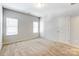 Bright bedroom with neutral walls and carpet flooring at 104 N Canyon Ridge Dr, Mount Holly, NC 28120