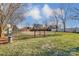 Community dog park with fenced area and waste disposal at 104 N Canyon Ridge Dr, Mount Holly, NC 28120