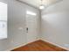 Bright entryway with hardwood floors and white door at 104 N Canyon Ridge Dr, Mount Holly, NC 28120