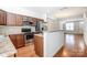 Modern kitchen with stainless steel appliances and wood cabinets at 104 N Canyon Ridge Dr, Mount Holly, NC 28120