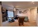 Living room featuring a ceiling fan, sofa, rocking chair, and a cat tree at 104 Sycamore Crossing Ct, Locust, NC 28097