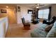 Living room with a ceiling fan, sofa, and a cat tree at 104 Sycamore Crossing Ct, Locust, NC 28097