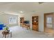 Spacious bedroom featuring built-in wooden bookshelves and neutral carpet at 10417 Sutherby Dr, Charlotte, NC 28277