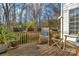 Cozy wooden deck featuring planters and outdoor seating, perfect for enjoying nature at 10417 Sutherby Dr, Charlotte, NC 28277