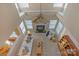 Aerial view of the living room with fireplace and vaulted ceiling at 10417 Sutherby Dr, Charlotte, NC 28277