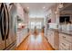 Gourmet kitchen with modern appliances, granite counters, and hardwood floors at 105 Plantation Ct, Shelby, NC 28150