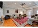 Bright living room boasts hardwood floors, a trey ceiling, and ample seating at 105 Plantation Ct, Shelby, NC 28150