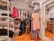 Spacious walk-in closet with custom shelving and hardwood floors at 105 Plantation Ct, Shelby, NC 28150