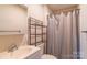 Clean bathroom with shower, toilet and vanity at 1127 Ansonville Rd, Wingate, NC 28174