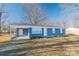 Blue ranch style home with covered porch and a nice yard at 1127 Ansonville Rd, Wingate, NC 28174