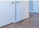 Clean hallway with light walls and wood-look flooring at 1127 Ansonville Rd, Wingate, NC 28174