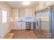 Updated kitchen, featuring stainless steel appliances and granite countertops at 1127 Ansonville Rd, Wingate, NC 28174