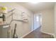 Laundry room with shelving and water heater at 1127 Ansonville Rd, Wingate, NC 28174