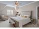 Serene main bedroom with a ceiling fan, neutral decor, and an inviting atmosphere for relaxation at 134 Wild Harbor Rd, Mooresville, NC 28117