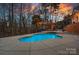 Backyard with a private pool, gazebo, landscape design, and outdoor entertaining space at 134 Wild Harbor Rd, Mooresville, NC 28117