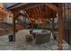 Outdoor living area with a fire pit and pool, perfect for entertaining and relaxing at 134 Wild Harbor Rd, Mooresville, NC 28117