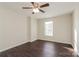 Spacious bedroom with dark hardwood floors and ceiling fan at 152 Oliver St, York, SC 29745