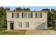 Two-story house with white siding, black shutters, and a two-car garage at 152 Oliver St, York, SC 29745