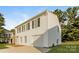 White two-story house with black shutters, a two-car garage, and a side view at 152 Oliver St, York, SC 29745