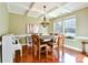 Elegant dining room with coffered ceilings, hardwood floors, and a large dining table for gatherings at 162 Misty Woods Dr, Lake Wylie, SC 29710