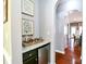 Stylish hallway nook with granite countertop, mini fridge, and decorative artwork at 162 Misty Woods Dr, Lake Wylie, SC 29710