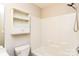 Clean bathroom with a shower/tub combo and shelving at 1655 Baylor Dr, Rock Hill, SC 29732