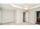 Main bedroom with neutral walls, ceiling fan, and access to the bathroom at 1655 Baylor Dr, Rock Hill, SC 29732