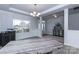 Elegant dining room featuring hardwood floors and a large table at 170 Swann Rd, Statesville, NC 28265