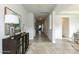 Long hallway with hardwood floors and a view into the living room and kitchen at 170 Swann Rd, Statesville, NC 28265