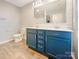 Bathroom boasts double vanity and modern fixtures at 1721 Ameria Rd, Charlotte, NC 28215