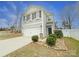 Two-story house with gray siding, a two-car garage, and stone accents at 1721 Ameria Rd, Charlotte, NC 28215